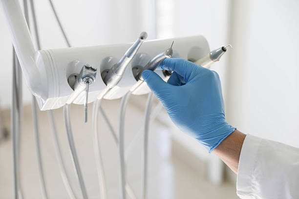 Professional Emergency Dentist technician working in Pearl Beach, MI